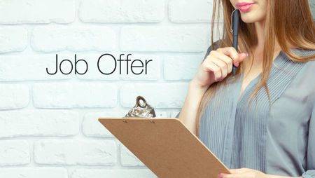 Woman holding clipboard job offer