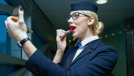 flight attendant with perfect uniform