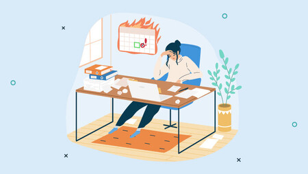 Exhausted worker struggling at her desk