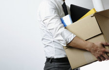 Man with box of belongings