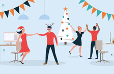 workers dancing and celebrating at office Christmas party setting