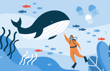 Marine biologist scuba diving in the ocean surrounded by sea creatures
