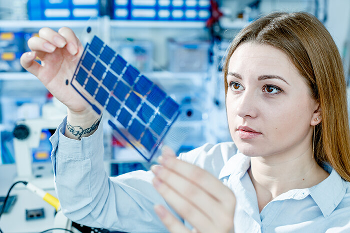 Woman working in solar scientific research job