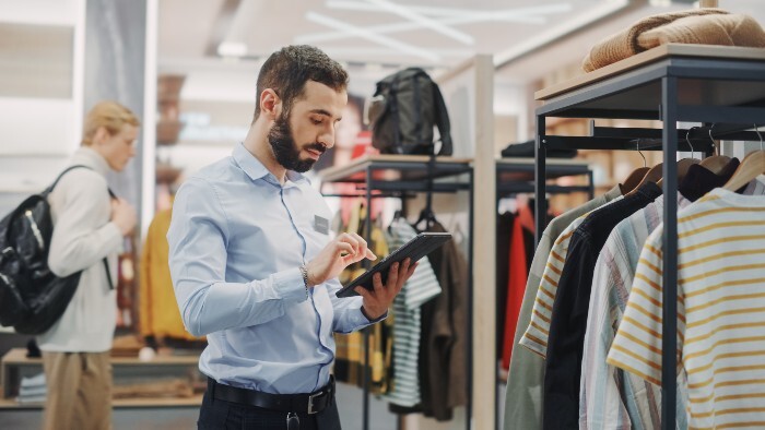 Visual Merchandiser organizing