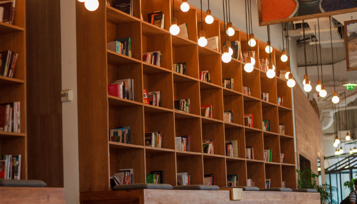 A tall wooden bookcase with books